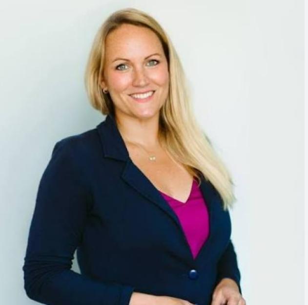 Dr. Kristen Mark, of the University of Minnesota, smiling.