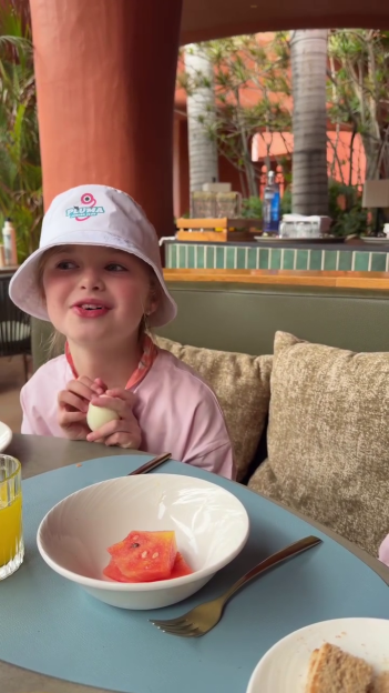 Amy Childs' daughter trying an egg for the first time.