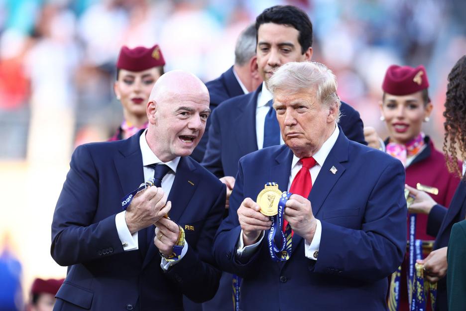 New Jersey, USA. 19th July, 2026. Gianni Infantino, president of FIFA and Donald Trump, president of the United States of America show the crowd the gold medals after the Spain vs Argentina FIFA World Cup final match at the Metlife Stadium, New Jerse
