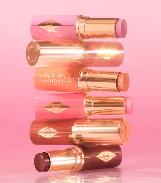 Charlotte Tilbury Unreal Blush Healthy Glow Sticks in various shades.