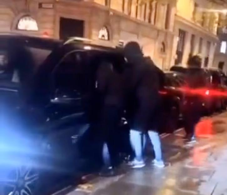 People exiting a black van at night, with text overlay "Vito van With Jewels & No #SchoolBoyError".