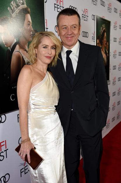 Gillian Anderson and Peter Morgan on the red carpet for "The Crown" TV show Season 3 gala screening.