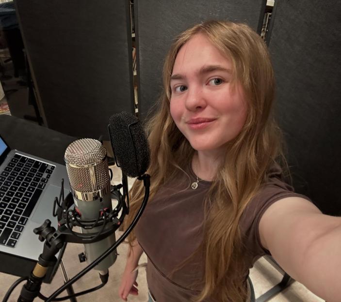Hanna Andrea preparing to record a musical.