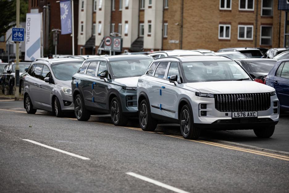 Locals furious as motors from ‘dangerous’ car dealership spill out into street blocking roads and causing ‘gridlock’