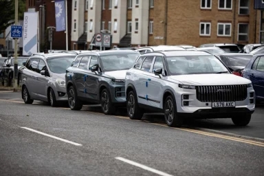 Locals furious as motors from ‘dangerous’ car dealership spill out into street blocking roads and causing ‘gridlock’