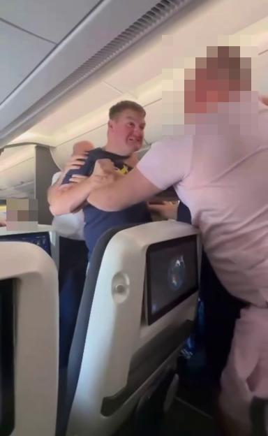Drunken Thug Brawls with British Airways Crew and Passengers on Busy Heathrow Runway Before Arrest