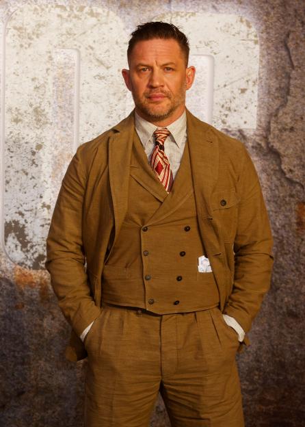 Tom Hardy in a brown suit at the Havoc world premiere.