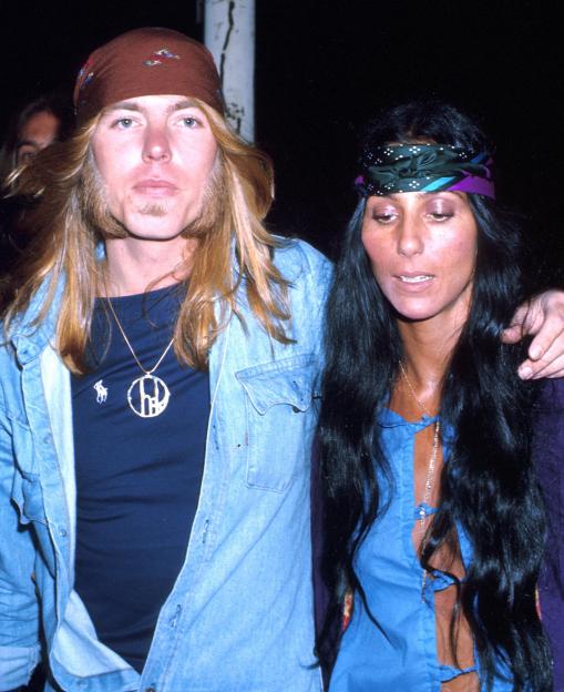 Gregg Allman and Cher at an event.