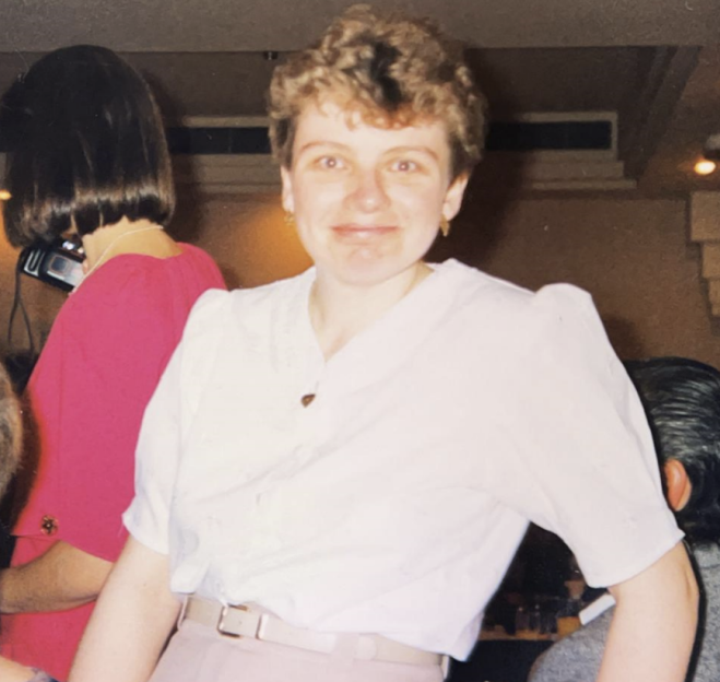 Joy Boulton, a 59-year-old woman, smiling.