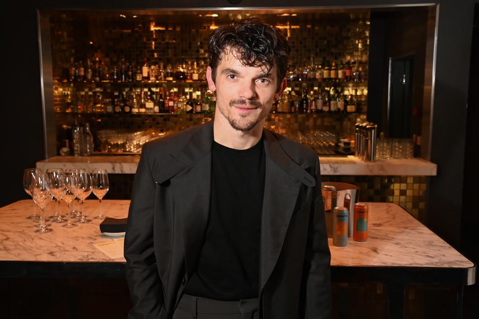 Edward Bluemel at the "Born With Teeth" after party.