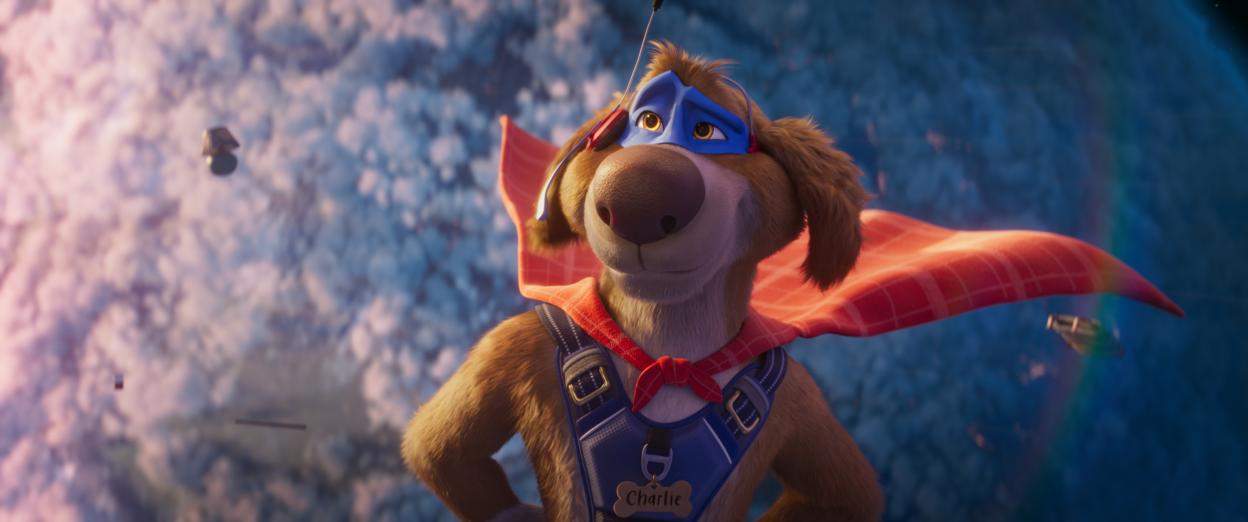 Illustration of Charlie the Wonderdog wearing a blue superhero mask and red cape.