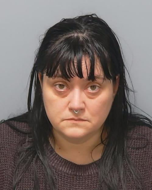 Mugshot of Hayley Bell, convicted of public nuisance, preventing the decent burial of a body, and fraud offenses.