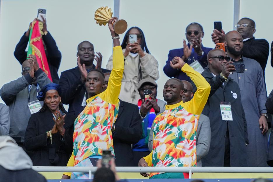Senegal players celebrate with the Africa Cup of Nations trophy.