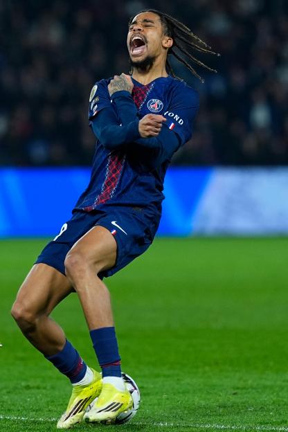 Bradley Barcola of Paris Saint-Germain F.C. reacts after failing to score during a match against AS Monaco.