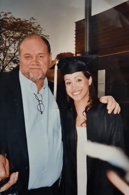 Thomas Markle and his daughter Meghan Markle in her graduation cap and gown.
