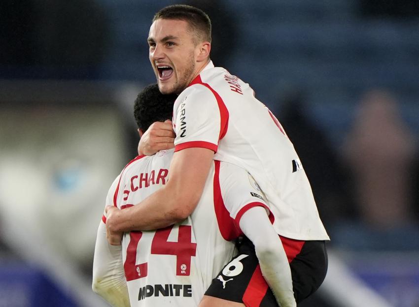 Southampton players Shea Charles and Taylor Harwood-Bellis celebrate at the final whistle.