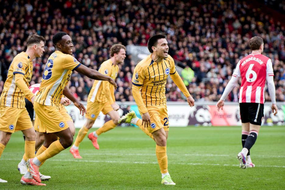 Brighton & Hove Albion players celebrate a goal against Brentford.