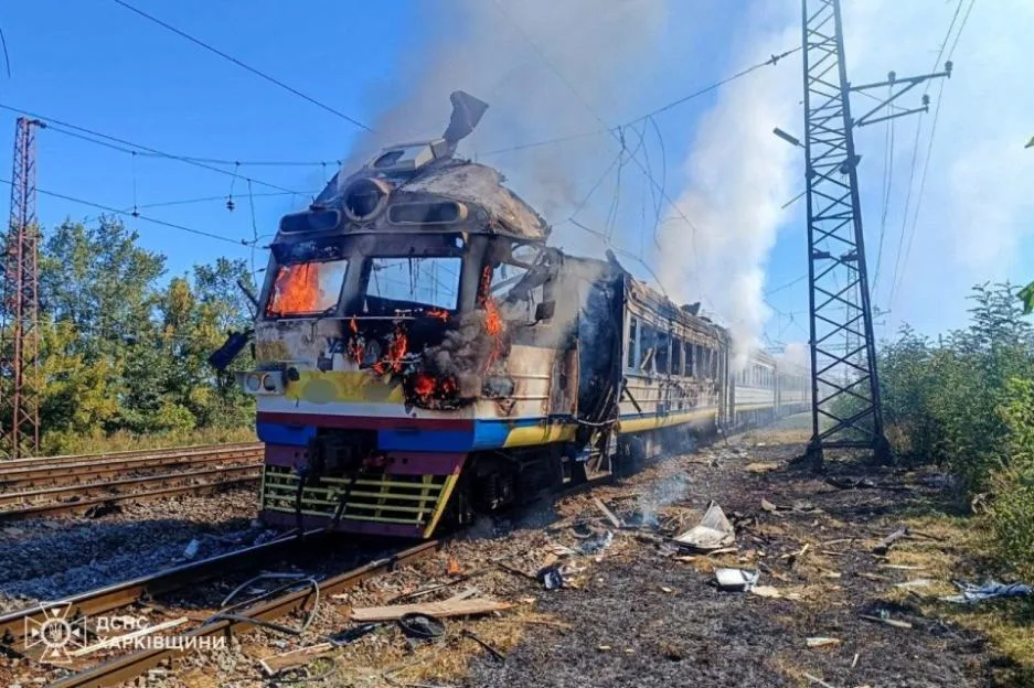 A passenger train locomotive burning after a drone strike in the Kharkiv region of Ukraine.