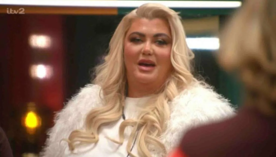 Gemma Collins talking in a white feathery top, with the ITV2 logo in the upper left corner.