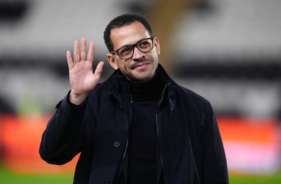 Chelsea manager Liam Rosenior waving at the Emirates FA Cup fourth round match.