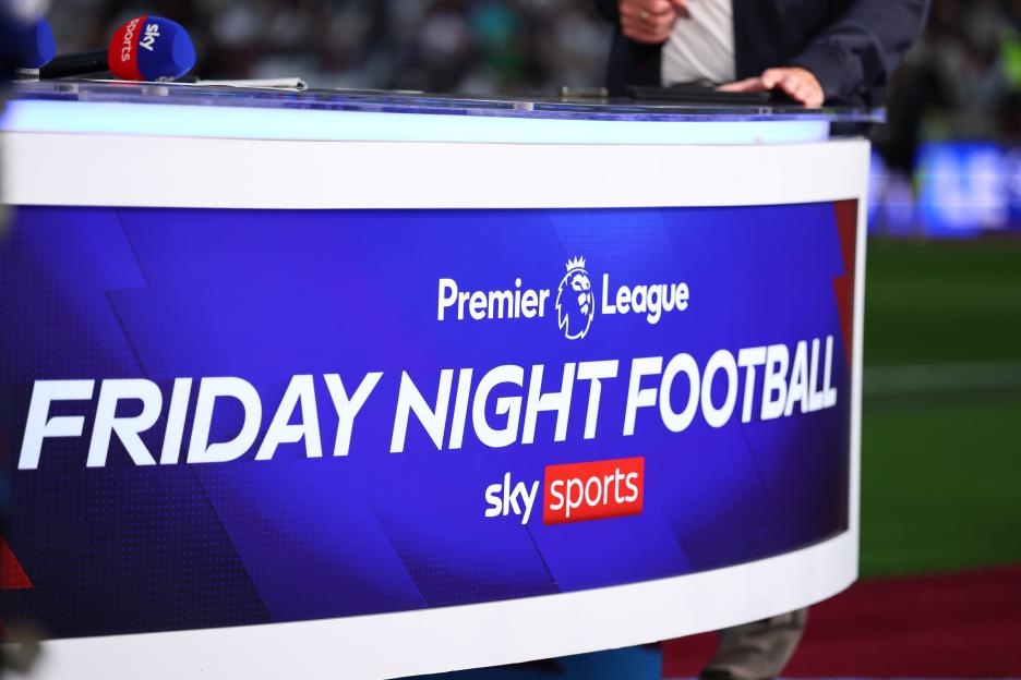 Sky Sports Friday Night Football branding on a desk during a Premier League match.