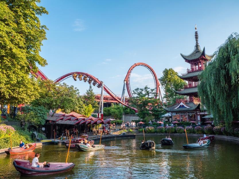The Dragon Boats, Boating Lake and Rollercoaster Ride, Tivoli Gardens, Copenhagen, Zealand, Denmark, Europe.
