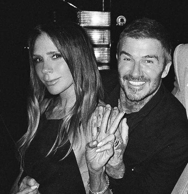 Black and white photo of Victoria Beckham, David Beckham, a man in glasses, and Kendall Jenner.