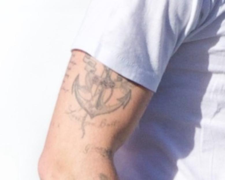 Brooklyn Beckham and Nicola Peltz holding hands.