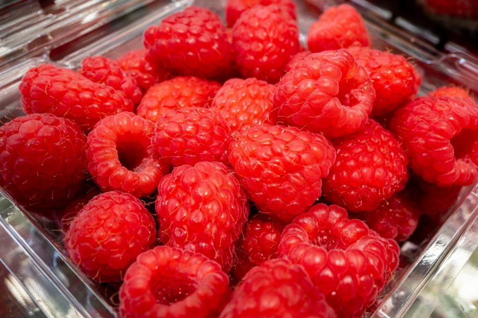 Container of fresh raspberries.