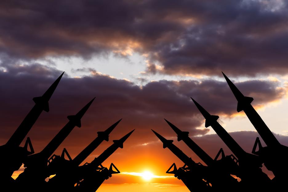 Missile system on the background of the sunset.