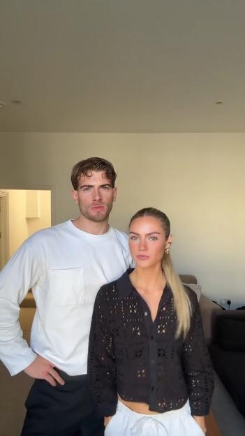 Livvy and Joel Evans posing together, revealing their new romance.
