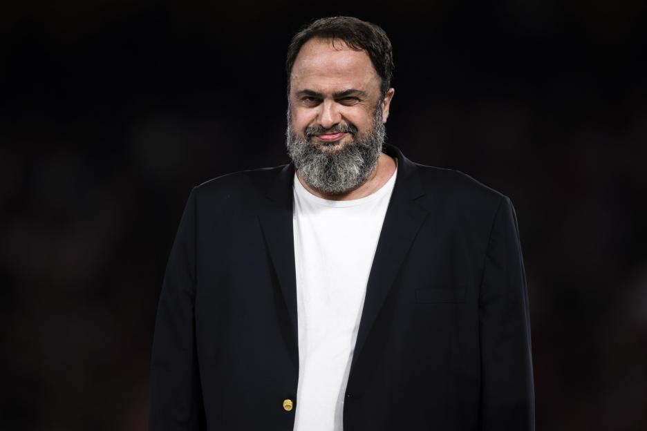 Evangelos Marinakis, president of Olympiacos FC, smiles.