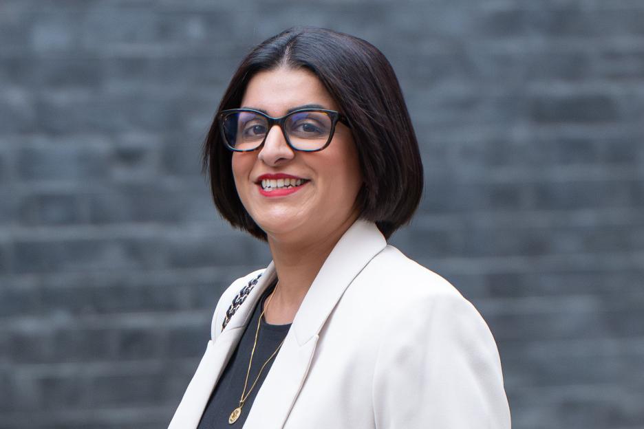 Shabana Mahmood, UK Home Secretary, smiling while arriving at 10 Downing Street for a Cabinet meeting.