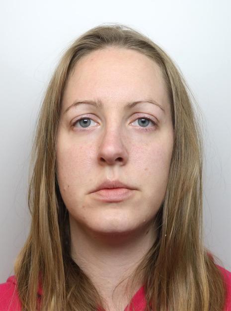 Mugshot of convicted serial killer Lucy Letby, a white woman with long, light brown hair and blue eyes, wearing a pink top.