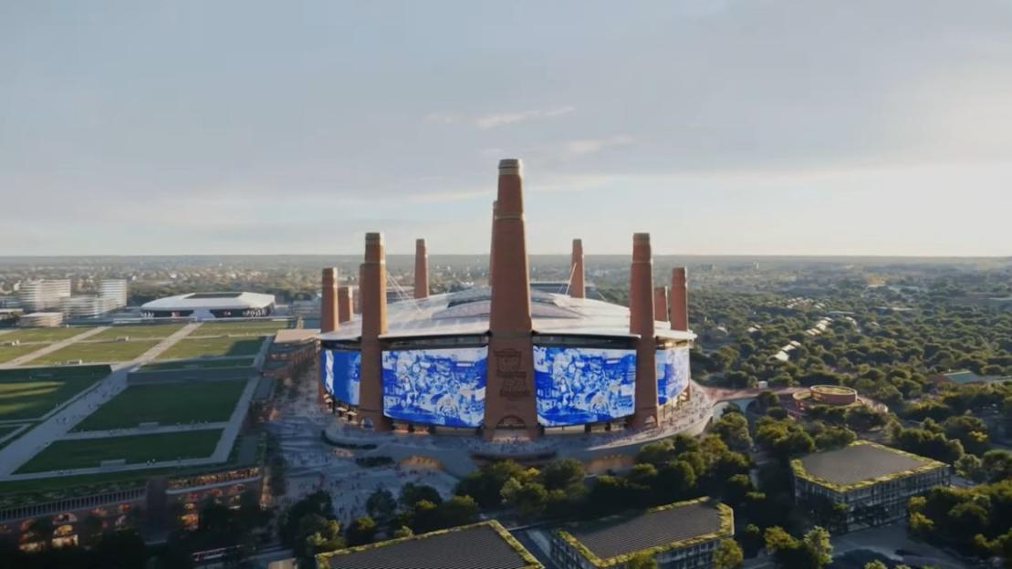 Illustration of a large stadium with multiple tall, brown smokestacks on top, surrounded by green fields and distant buildings.