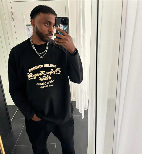 Sharky (Sharmarke Mohamud) of Beta Squad taking a mirror selfie.
