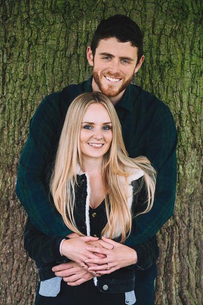 PC Andrew Harper with his wife, Lissie Harper, standing in front of a tree.