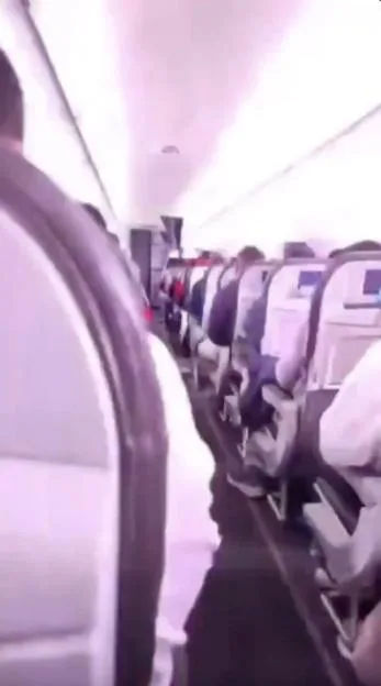 Shocking moment lightning strike hits passenger plane with blinding flash as terrified travellers hear ‘loud bang’