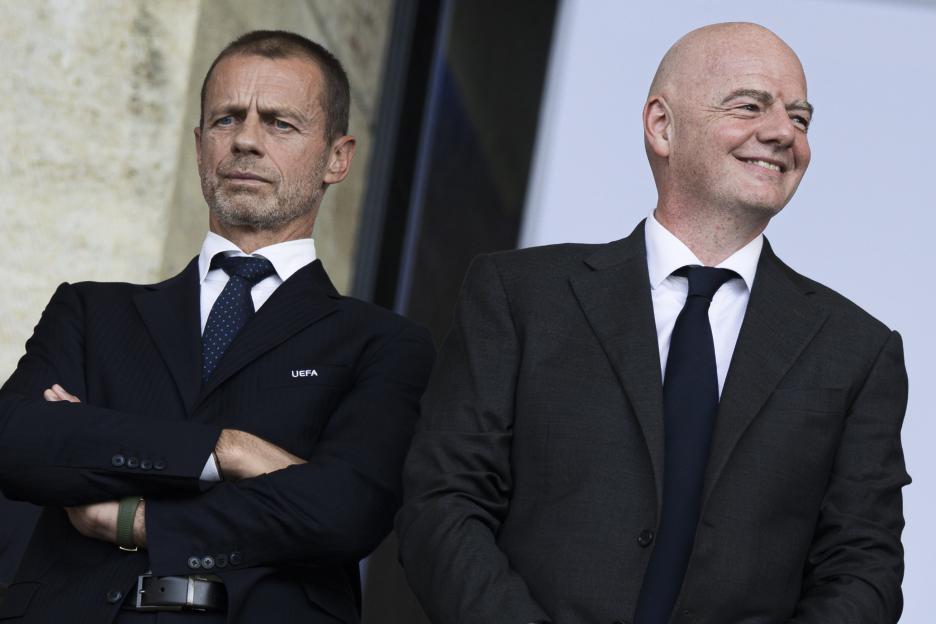Aleksander Ceferin (L), president of UEFA, and Gianni