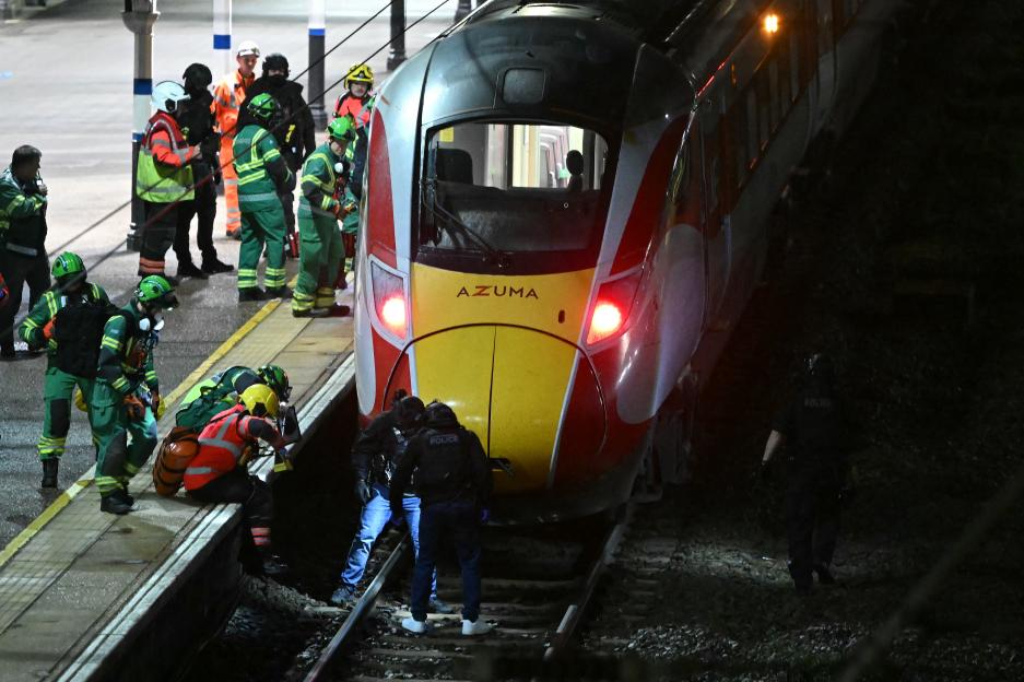 Emergency services and police search beneath an LNER Azuma train at Huntingdon Station following a stabbing.