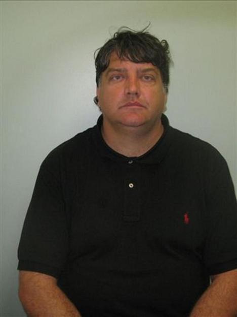 Mugshot of Jason Moore.