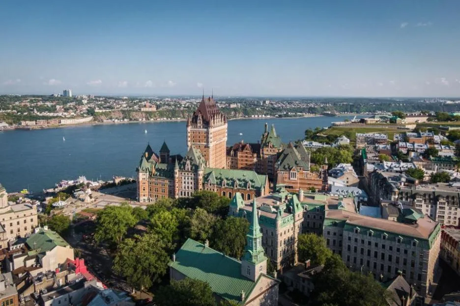 Aerial view of Quebec City including Frontenac Castle and the St. Lawrence River.