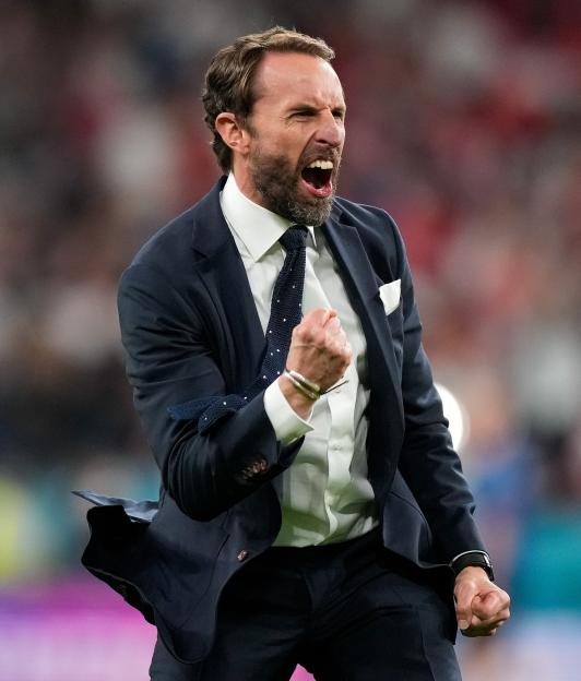 Gareth Southgate, head coach of England, celebrating his team's victory.