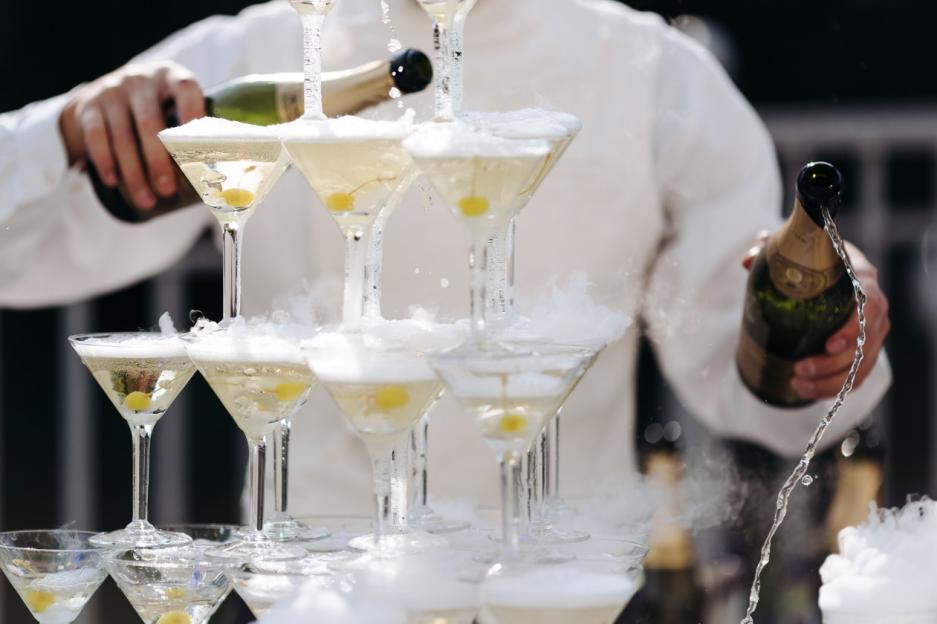 many glasses of champagne waiter pours; Shutterstock ID 300471593; purchase_order: -; job: -; client: -; other: -