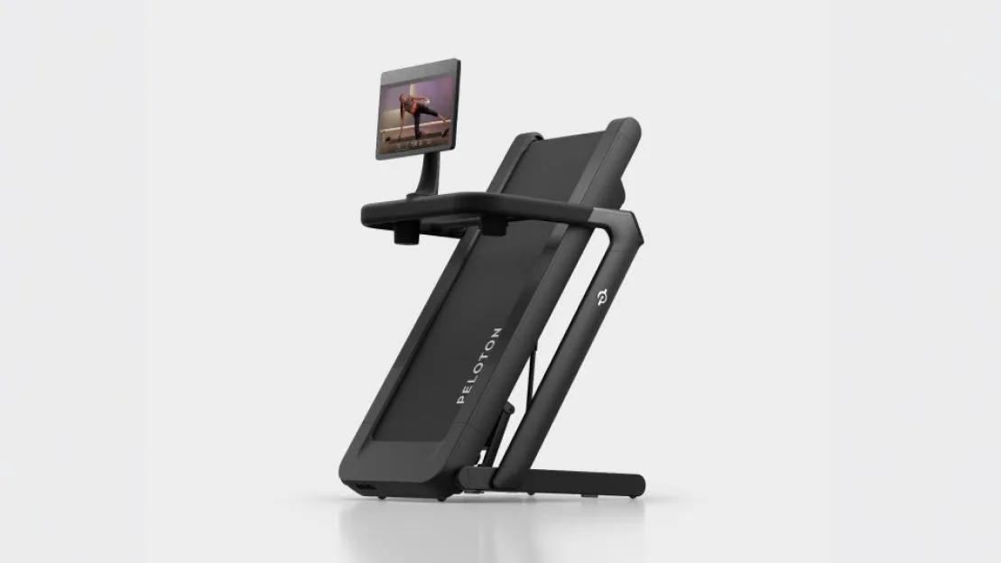 Peloton Tread Flex with a workout displayed on its screen.