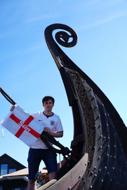 'England Raises Flag as They Prepare to Face Norway's Fearsome Viking Longboat Ahead of Key World Cup Clash'