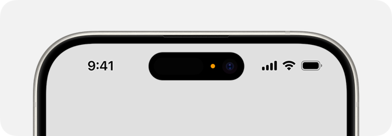 Illustration of an iPhone Dynamic Island displaying a small orange dot to indicate the microphone is active.