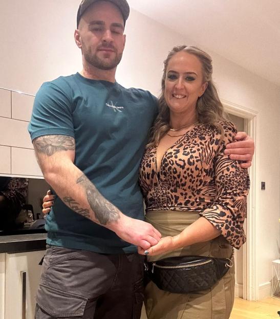 Couple posing for a photo.