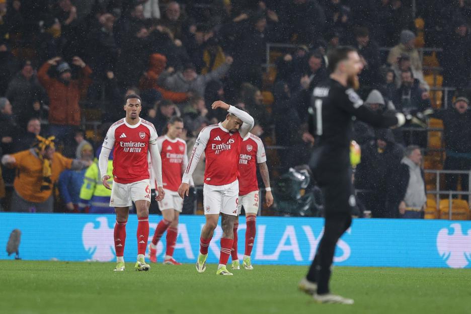 Arsenal players show dejection on the field during a Premier League match against Wolverhampton Wanderers.