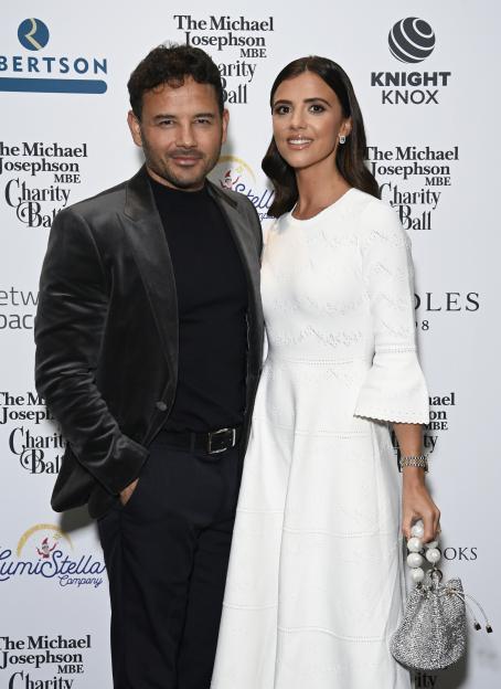 Lucy Mecklenburgh and Ryan Thomas posing at The Michael Josephson Charity Ball.